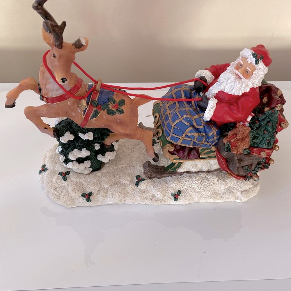 Santa in sleigh ornament